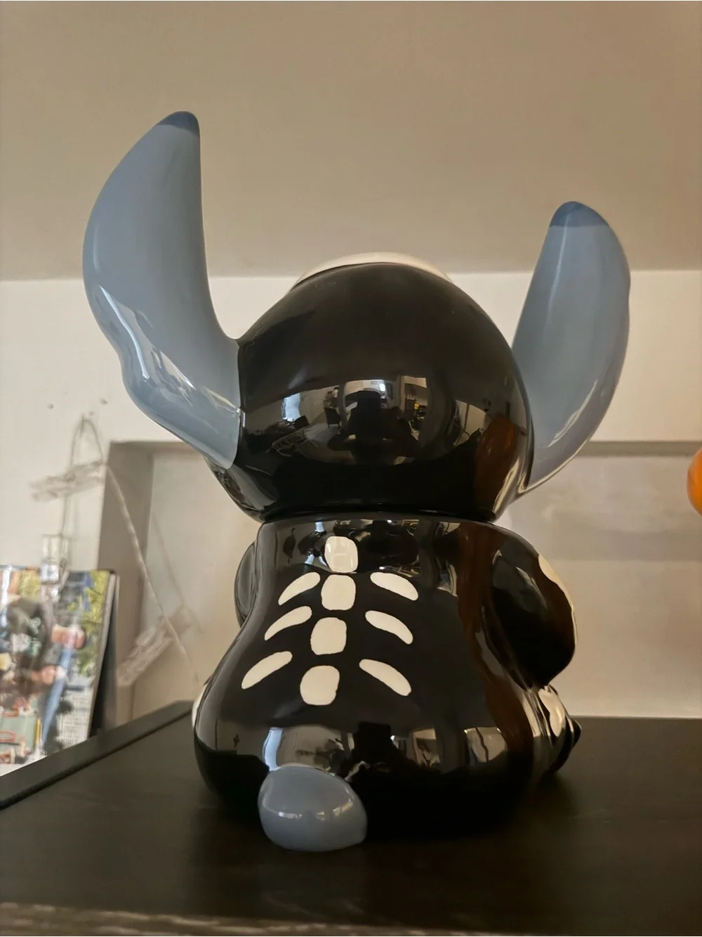 Whimsical Halloween Stitch Ceramic Figurine with doll.